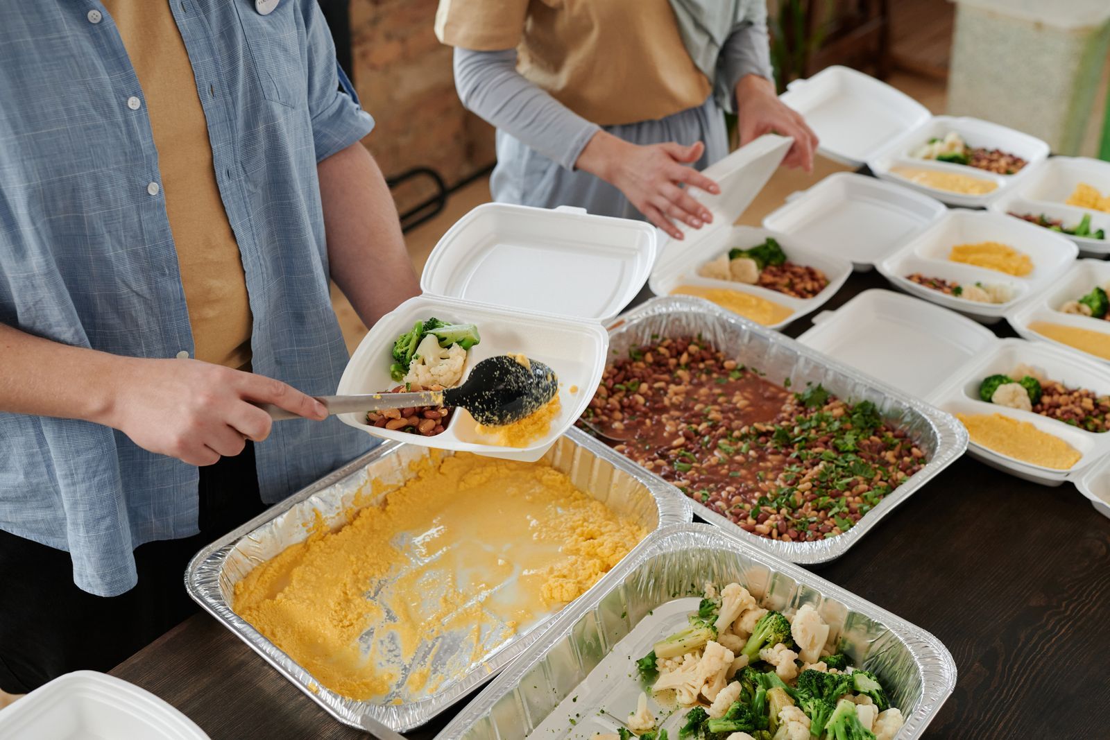 Volunteers serving food